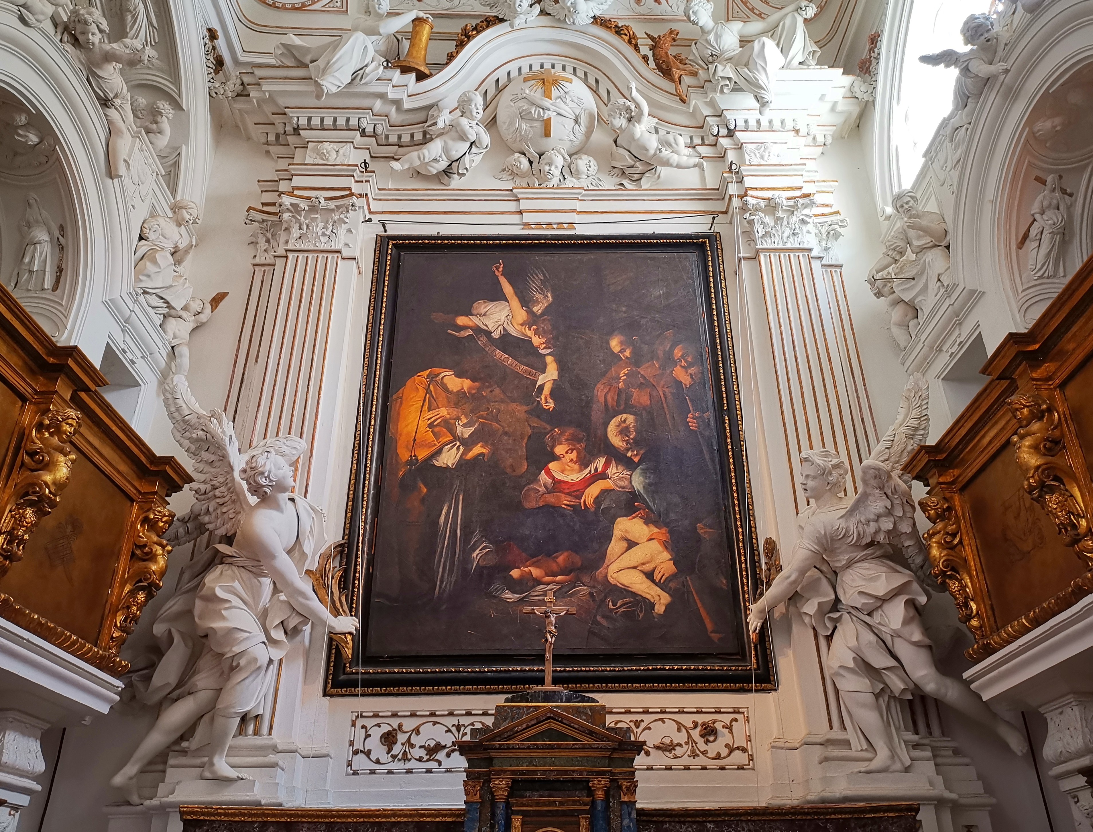 Oratorio de San Lorenzo - altar con copia Natividad de Caravaggio